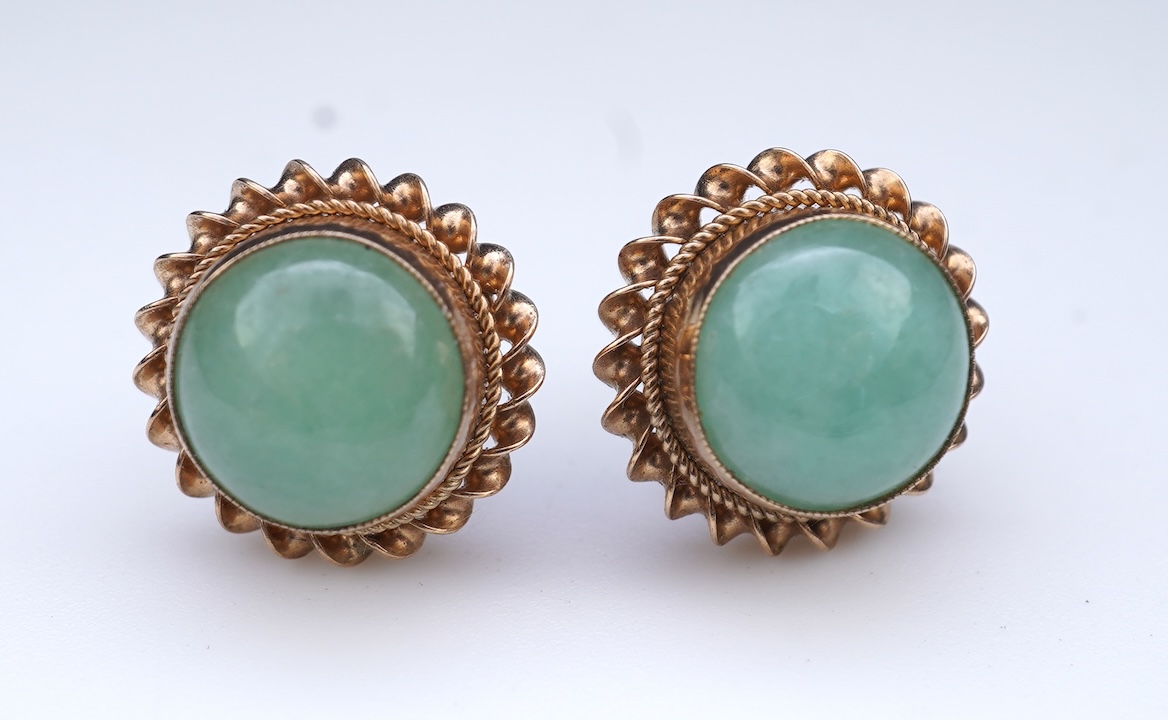 A collection of jadeite jewels, comprising: a bead bracelet with a silver clasp; together with three pairs of studs; one pair of hoop studs, one broken and restuck; and one pair of drop earrings, each set with jadeite, m